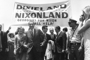 Richard M. Nixon, candidate for the Republican presidential nomination, is seen arriving at the airport in Atlanta, Ga. with his wife, Patricia, on May 31, 1968. A crowd of about 350 people greeted them as Nixon visits the South to meet with delegates from various states. (AP Photo)